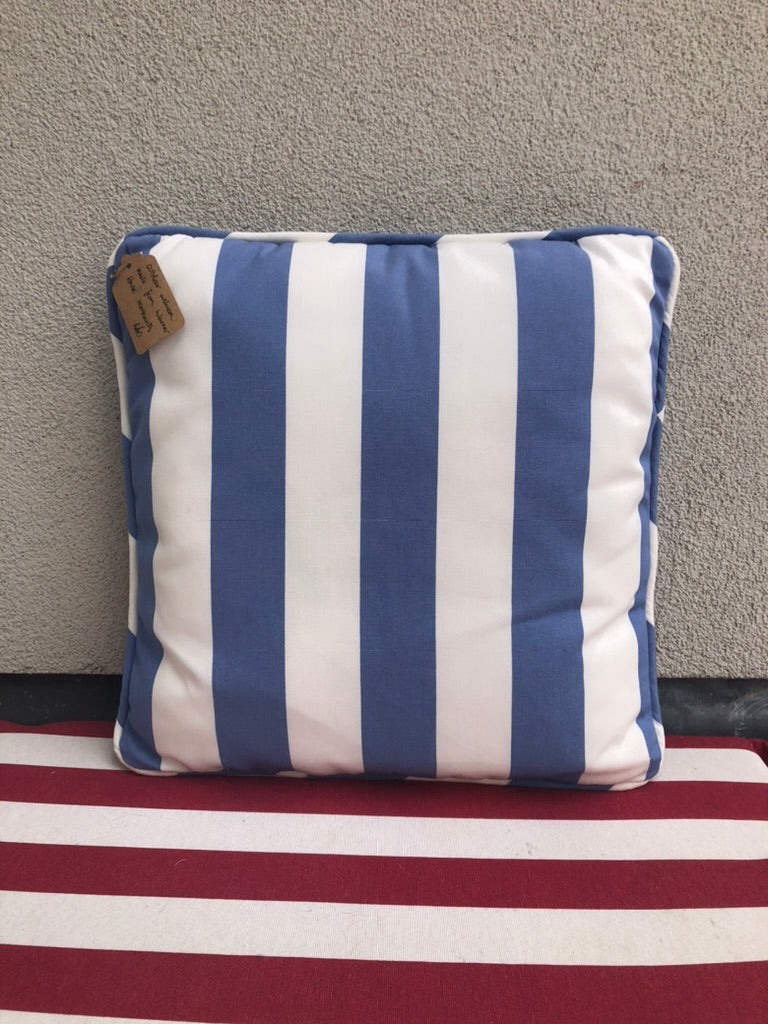 Handmade outdoor cushion from Warner House fabric remnants with piping.