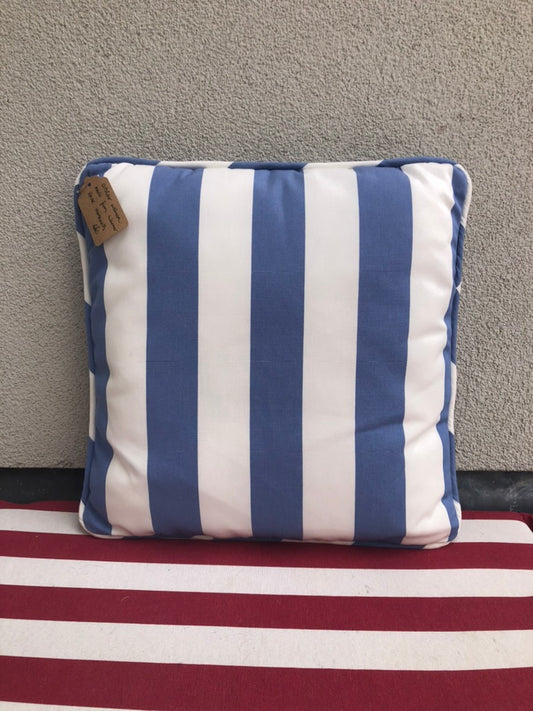 Handmade outdoor cushion from Warner House fabric remnants with piping.