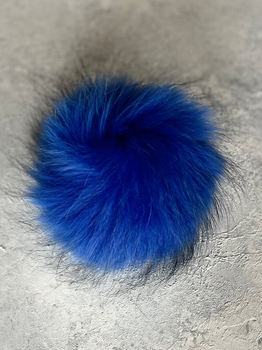 Grey cashmere plain knit beanie with stag embellishment & fur pom