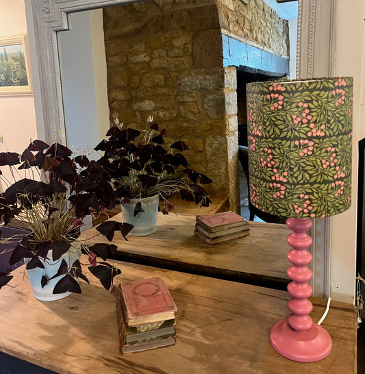 William Morris inspired pink and green handmade lampshade sitting on a hand painted pink bobble base.
